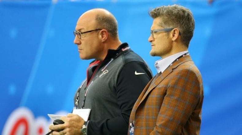 Falcons general manager Thomas Dimitroff and assistant general manager Scott Pioli were spotted together on the sidelines evaluating players during the Chick-fil-A Peach Bowl on Wednesday, Dec. 31, 2014, in Atlanta. It's not clear if Pioli, who has a larger role in the draft, will be made available to the local media leading up to the draft. (Curtis Compton/CCompton@ajc.com)