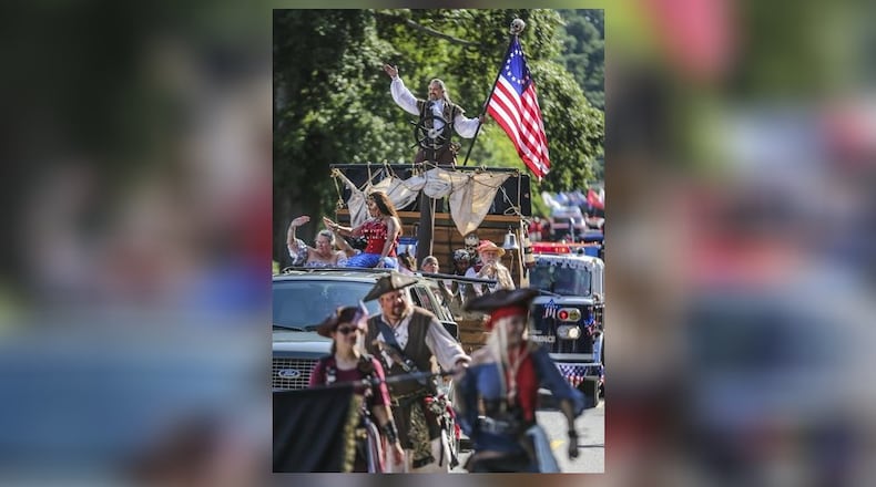 Dunwoody’s annual Fourth of July Parade in 2019 attracted more than 2,000 participants and 32,000 spectators. JOHN SPINK/JSPINK@AJC.COM
