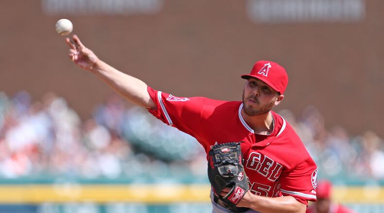 Michael Kohn #58 of the Los Angeles Angels of Anaheim pitches in the eight inning of the game against the Detroit Tigers at Comerica Park on April 20, 2014 in Detroit, Michigan. (Photo by Leon Halip/Getty Images)
