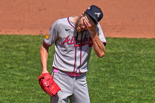 Braves pitcher Chris Sale collects himself between fifth-inning batters Sunday.