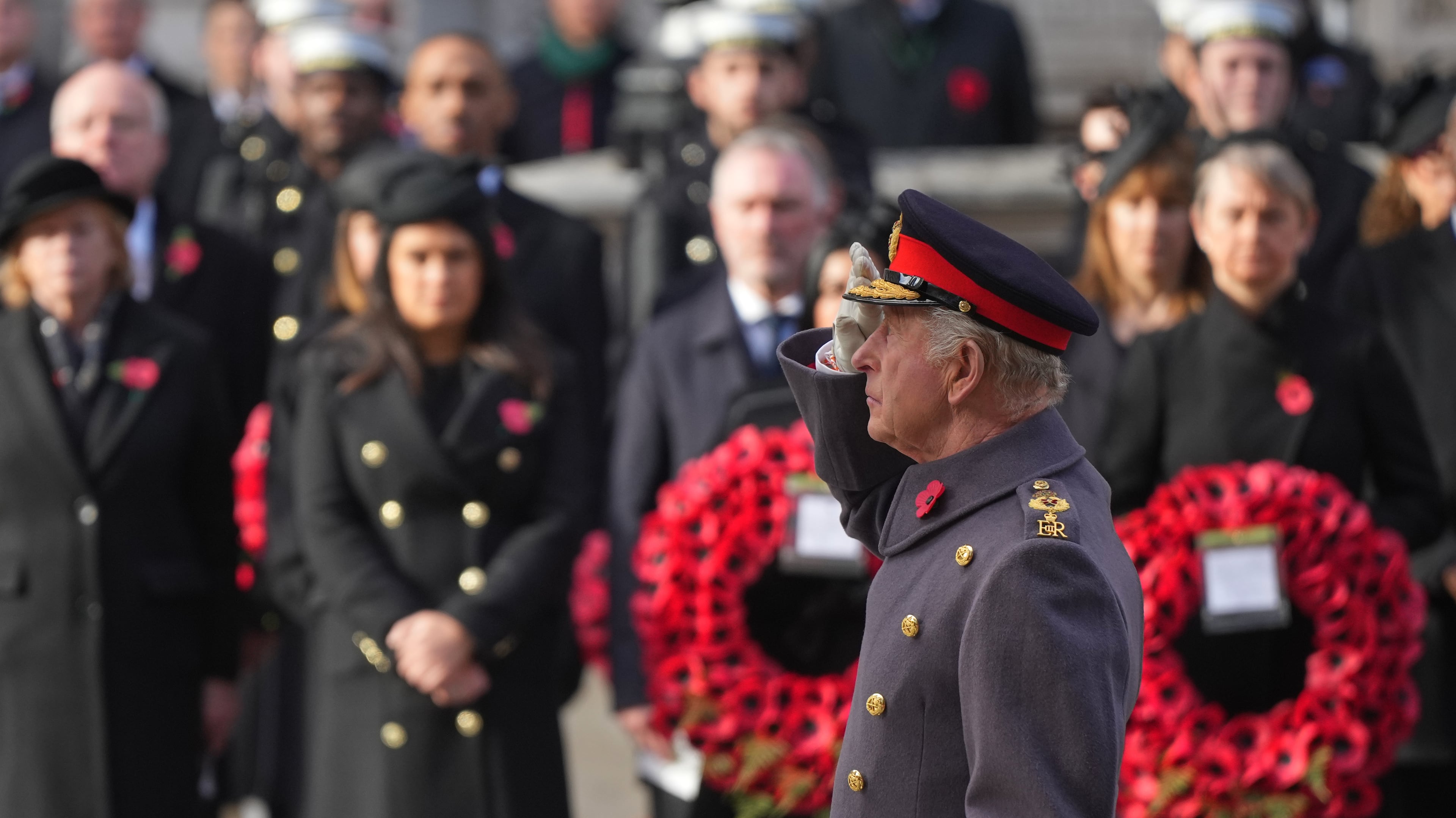 Britain's King Charles III salutes as he attends the Remembrance Sunday Service at the Cenotaph in London, Sunday, Nov. 9, 2025.(AP Photo/Alastair Grant, Pool)