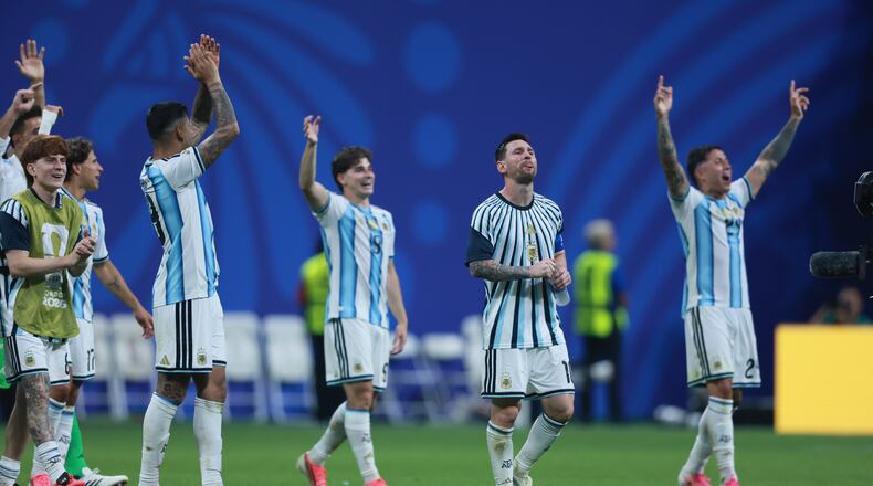 Argentina’s Lionel Messi (second from right) and his teammates wave to fans after winning their FIFA World Cup match against Egypt at Atlanta Stadium on Tuesday, July 7, 2026. (Jason Getz/AJC)
