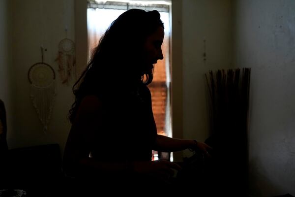 FILE - Kyleigh Thurman, one of the patients who filed a federal complaint against an emergency room for not treating her ectopic pregnancy, talks about her experience at her studio, Aug. 7, 2024, in Burnet County, Texas. (AP Photo/Eric Gay, File)