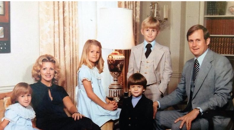 Gary Rollins and his family, 30 years before the family feud erupted over the Rollins empire. Left to right are: daughter Nancy, ex-wife Ruthie, daughter Ruth Ellen, son O.Wayne II, son Glen, and their father, Gary. (AJC file photo.)