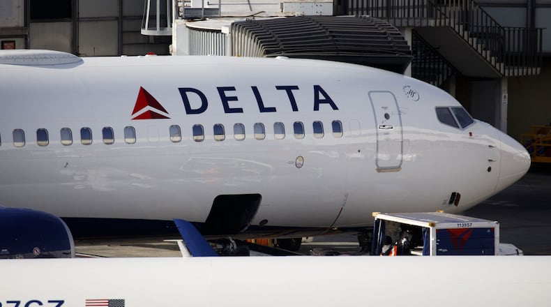 Baggage is unloaded from a Delta Air Lines plane at Los Angeles International airport in Los Angeles on April 5, 2018. MUST CREDIT: Bloomberg photo by Patrick T. Fallon.