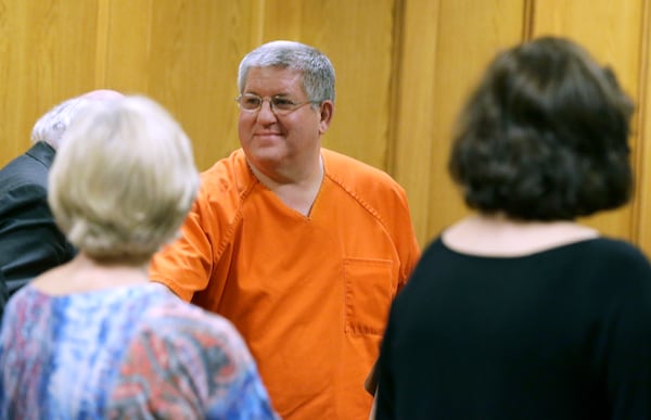 FILE- Inmate Bernie Tiede smiles after a court hearing granting his release at the Panola County court house, May 6, 2014, in Carthage, Texas. (AP Photo/LM Otero, File)