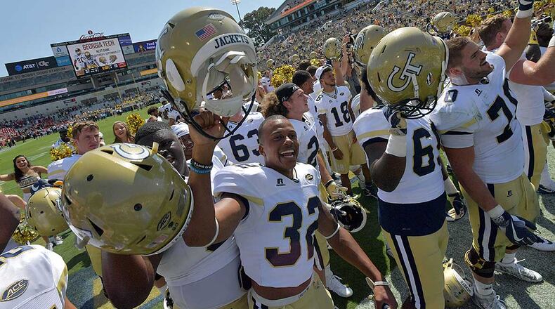 Georgia Tech players celebrate after the 37-10 victory over Jacksonville State Sept. 9. The Jackets will face Pitt in their ACC opener Saturday at Bobby Dodd Stadium. Hyosub Shin/hshin@ajc.com