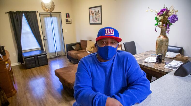 Kenneth Walker sits in his apartment at the  Manor at Indian Creek in Stone Mountain Mondy, November 29, 2021.  STEVE SCHAEFER FOR THE ATLANTA JOURNAL-CONSTITUTION