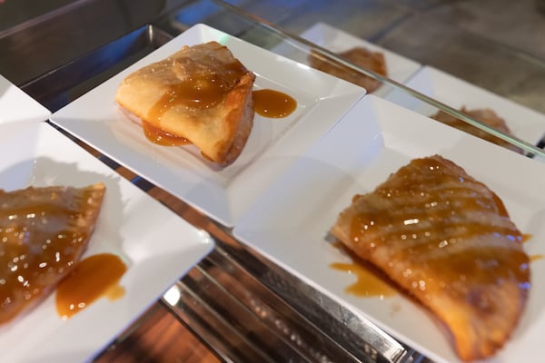Peach hand pie at a food showcase event at State Farm Arena. (Arvin Temkar/AJC)