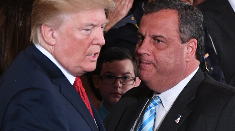 Then-President Donald Trump, left, speaks with then-New Jersey Gov. Chris Christie in 2017 in the East Room of the White House in Washington, D.C. (Jim Watson/AFP/Getty Images/TNS)
