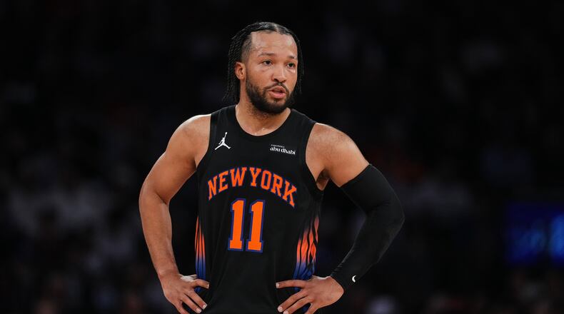 New York Knicks' Jalen Brunson (11) talks to a teammate during the first half in Game 5 of a first-round NBA playoffs basketball series against the Atlanta Hawks, Tuesday, April 28, 2026, in New York. (AP Photo/Frank Franklin II)