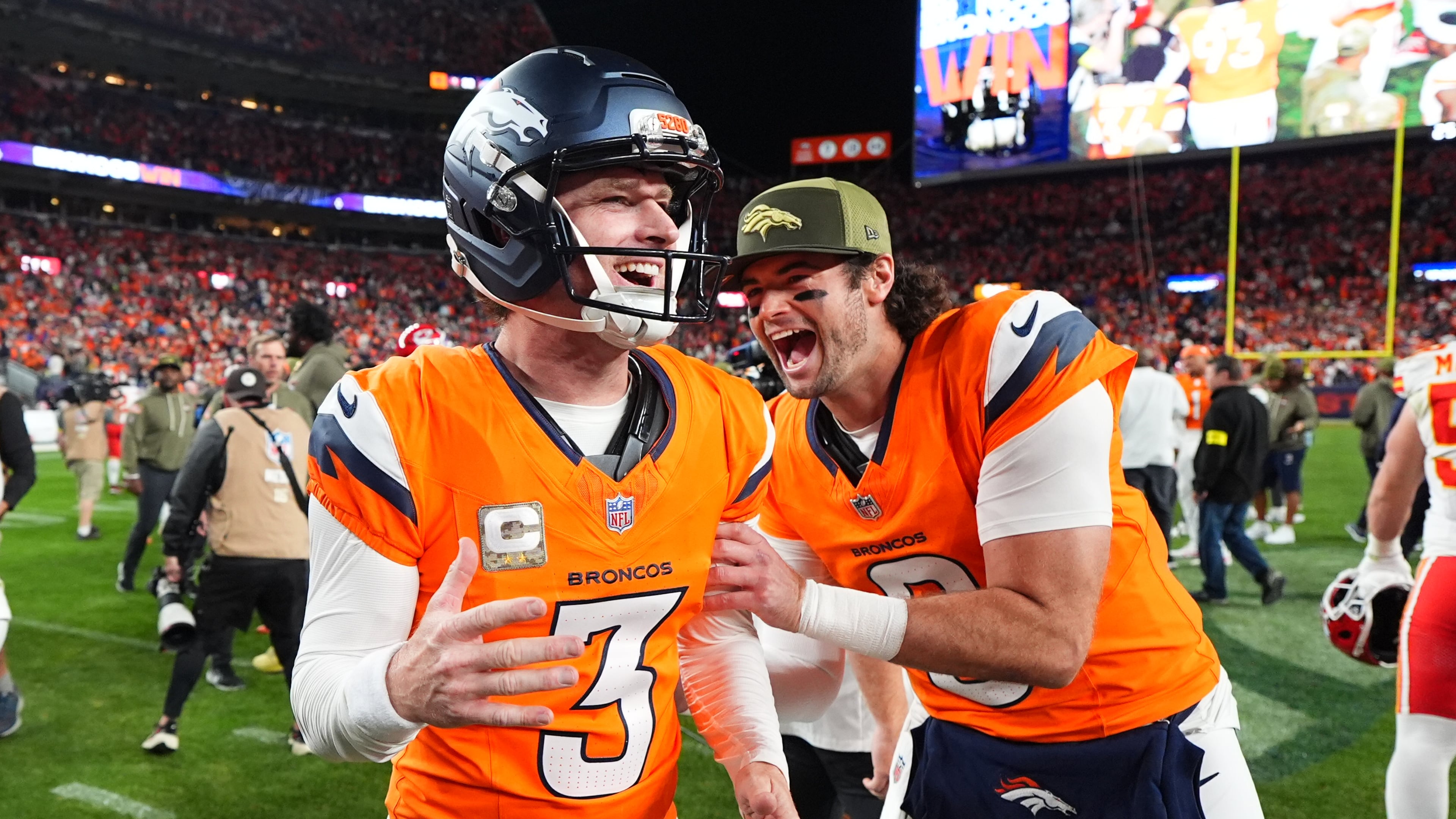 Denver Broncos place kicker Wil Lutz (3) is congratulated by teammate Jarrett Stidham, right, after celebrates making a 35-yard field goal to defeat the Kansas City Chiefs in an NFL football game Sunday, Nov. 16, 2025, in Denver. (AP Photo/Jack Dempsey)