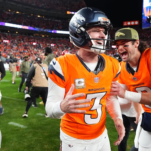 Denver Broncos place kicker Wil Lutz (3) is congratulated by teammate Jarrett Stidham, right, after celebrates making a 35-yard field goal to defeat the Kansas City Chiefs in an NFL football game Sunday, Nov. 16, 2025, in Denver. (AP Photo/Jack Dempsey)