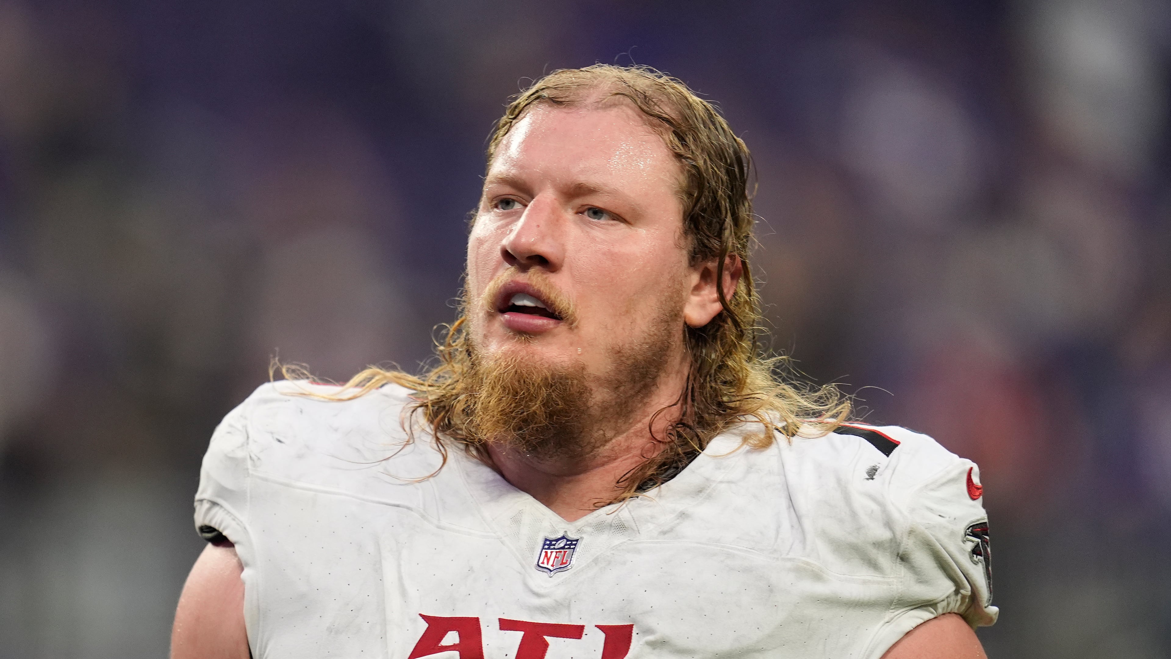 FILE - Atlanta Falcons offensive tackle Kaleb McGary (76) walks off the field after an NFL football game against the Minnesota Vikings, Sunday, Dec. 8, 2024, in Minneapolis. (AP Photo/Abbie Parr, file)
