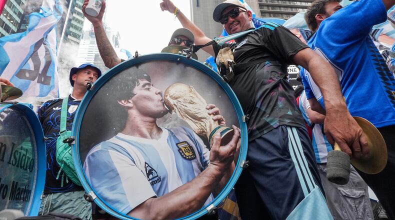 Argentina fans gather for a rally on the eve of the World Cup final soccer match in New York's Times Square, Saturday, July 18, 2026 (AP Photo/Frank Franklin II)