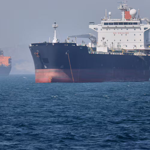 Oil tankers sit at anchor offshore in the Strait of Hormuz off Bandar Abbas, Iran, Saturday, May 2, 2026. (Amirhosein Khorgooi/ISNA via AP)