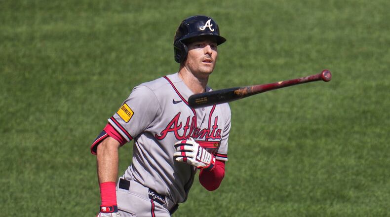 Atlanta Braves' Mike Yastrzemski tosses his bat as he runs down the first base line after hitting a grand slam off Pittsburgh Pirates pitcher Dennis Santana during the ninth inning of a baseball game in Pittsburgh, Thursday, July 9, 2026. (AP Photo/Gene J. Puskar)