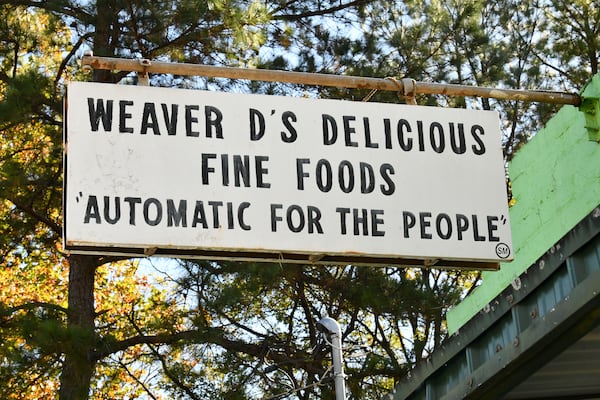 R.E.M. used Dexter Weaver’s “Automatic for the People” for the title of its 1992 album that went on to sell 18 million copies worldwide. Weaver says “Automatic” often — when someone opens his restaurant's door, when taking payment, when full takeout boxes are pushed into plastic bags. (Hyosub Shin/AJC)