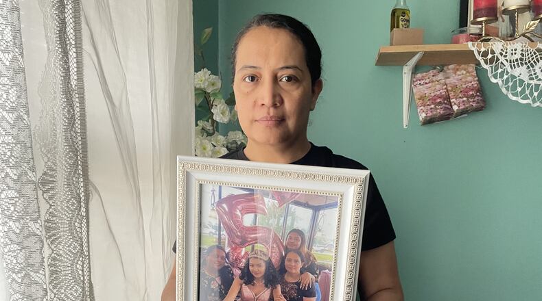 Susana Morales, 16, went missing the evening of July 26, 2022. Her body was found just over six months later, more than 20 miles from where she was last seen. During an interview in early 2023 with The Atlanta Journal-Constitution, Maria Bran showed pictures of her daughter. (Rosana Hughes/AJC)