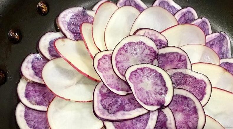 To ring in most new years, Melody Fury (@gourmetfury, gourmetfury.com) and her husband make prime rib, and this year’s feast included a potato galette with garlic confit and Parmesan that included thin slices of purple potatoes. Contributed by @gourmetfury