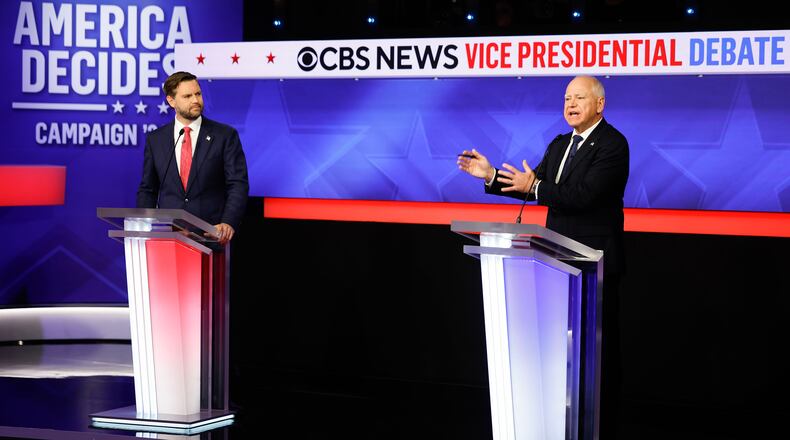 Republican U.S. Sen. JD Vance of Ohio (left) and Democratic vice presidential candidate Minnesota Gov. Tim Walz debated in New York on Tuesday.