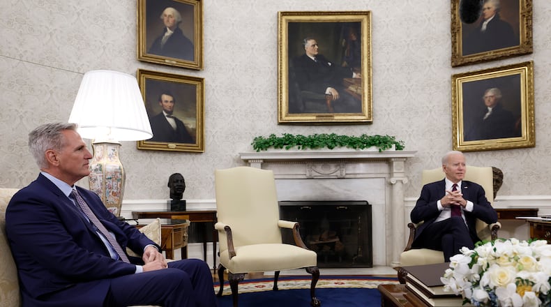U.S. Speaker of the House Kevin McCarthy, R-Calif., and President Joe Biden meet with other lawmakers in the Oval Office of the White House on May 9, 2023, in Washington, D.C. The two leaders met again on Tuesday afternoon. (Anna Moneymaker/Getty Images/TNS)