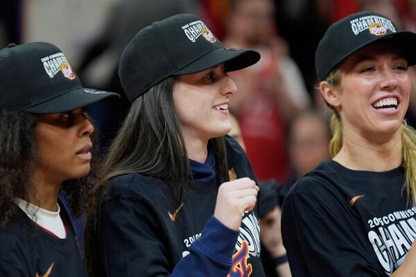 Indiana Fever guard Caitlin Clark (22) celebrates after winning the WNBA Commissioner's Cup championship basketball game against the Minnesota Lynx, Tuesday, July 1, 2025, in Minneapolis. (AP Photo/Abbie Parr)