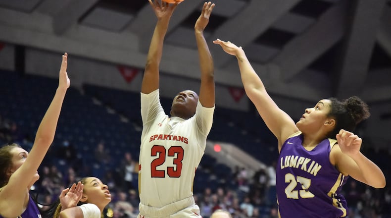 March 11, 2022 Macon - Greater Atlanta Christian's Trinity Thomas (23) shoots over Lumpkin County's Kate Jackson (23) during the 2022 GHSA State Basketball Class AAA Girls Championship game at the Macon Centreplex in Macon on Friday, March 11, 2022. (Hyosub Shin / Hyosub.Shin@ajc.com)