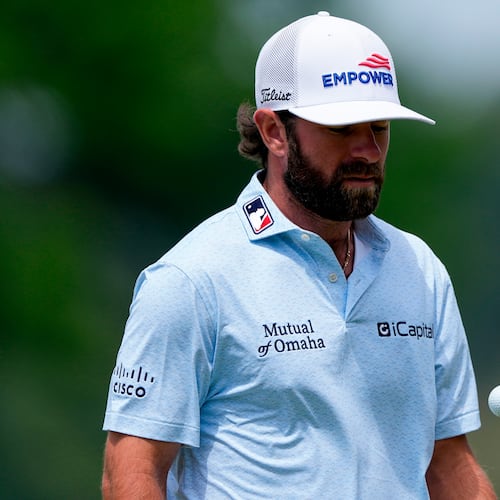 Cameron Young reacts tosses his ball on the fourth green during a PGA Championship golf tournament practice round at Aronimink Golf Club, Wednesday, May 13, 2026, in Newtown Square, PA. (AP Photo/Matt Slocum)