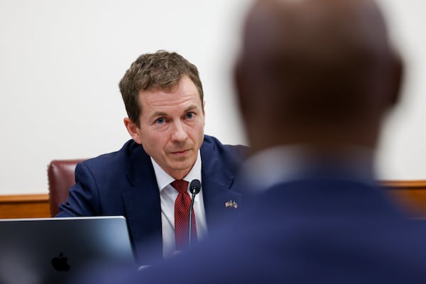 State Sen. Greg Dolezal, who is running for lieutenant governor, questions former Fulton County special prosecutor Nathan Wade at a Senate Special Committee on Investigations Subcommittee hearing Friday. The panel was created to investigate Fulton DA Fani Willis’ actions in the case she brought against Donald Trump. (Arvin Temkar/AJC)