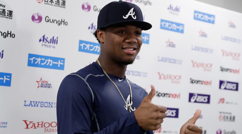 Braves outfielder Ronald Acuna poses for photographs during his 'National Lague Rookie of the Year' press conference prior to the game four between Japan and MLB All Stars at Mazda Zoom Zoom Stadium on Nov. 13, 2018, in Hiroshima, Japan.