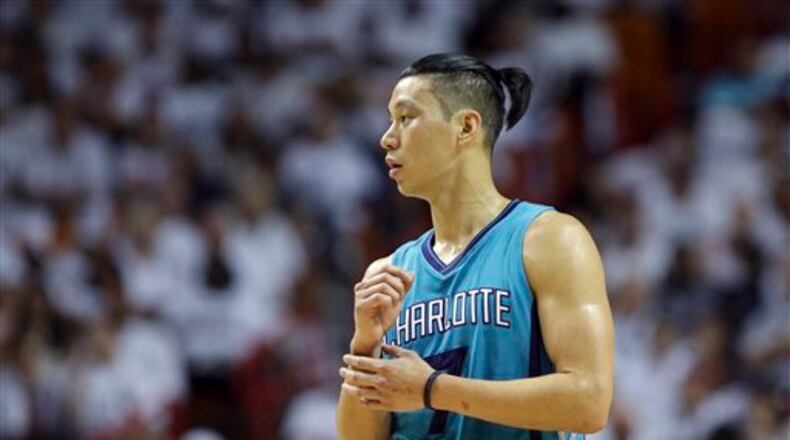 Charlotte Hornets guard Jeremy Lin walks on the court during the first half of Game 1 of a first-round NBA basketball playoff series, Sunday, April 17, 2016, in Miami. The Heat defeated the Hornets 123-91. (AP Photo/Lynne Sladky)