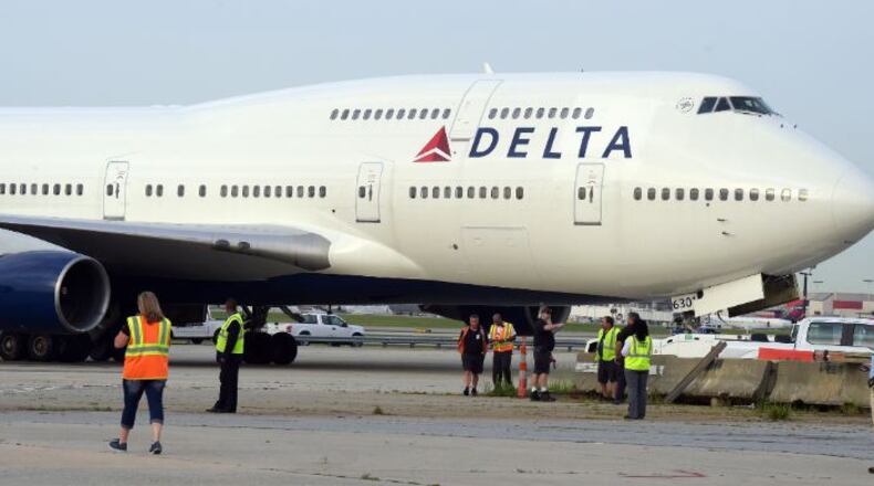 KENT D. JOHNSON /kdjohnson@ajc.com