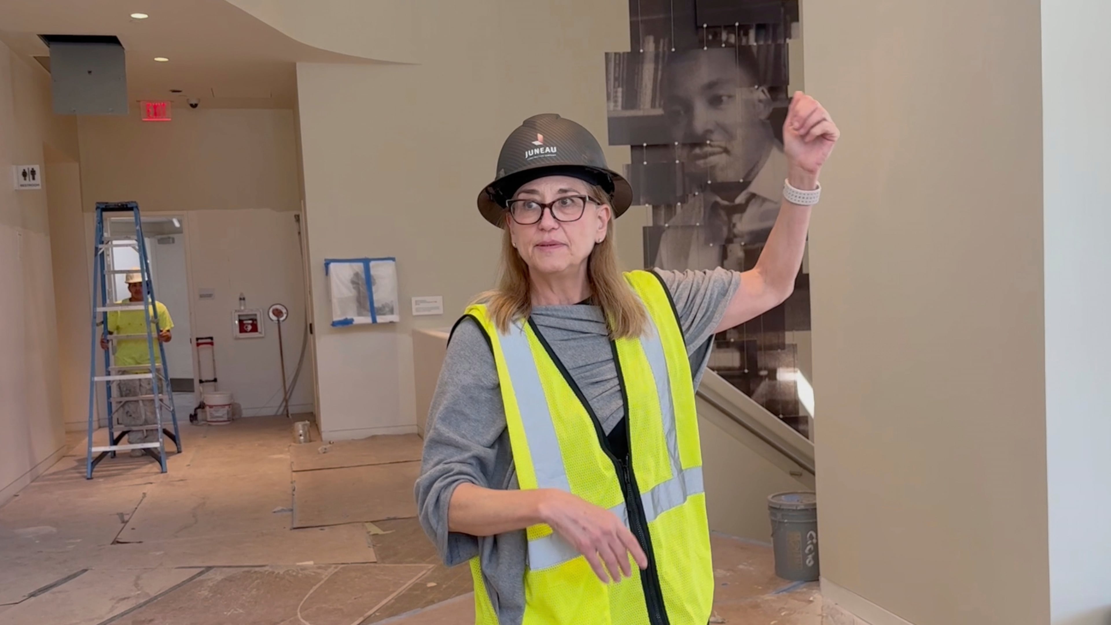 Jill Savitt, President and CEO of the National Center for Civil and Human Rights in Atlanta, leads a hard-hat tour of the expanded museum before its November reopening on Wednesday, Sept. 10, 2025. (AP Photo/Michael Warren)