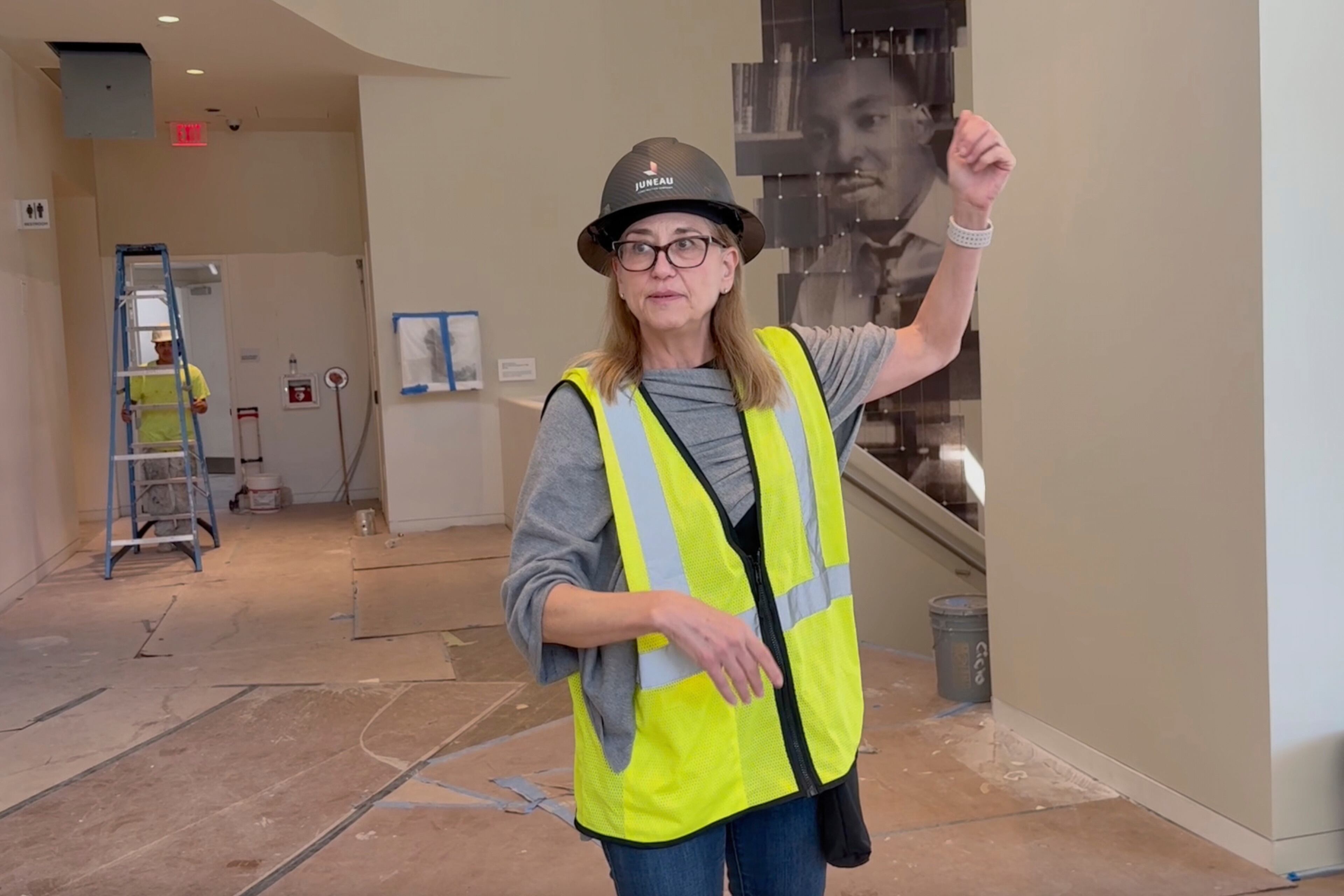 Jill Savitt, president and CEO of the National Center for Civil and Human Rights in Atlanta, leads a hard-hat tour of the expanded museum before its November reopening on Wednesday, Sept. 10, 2025. (Michael Warren/AP)
