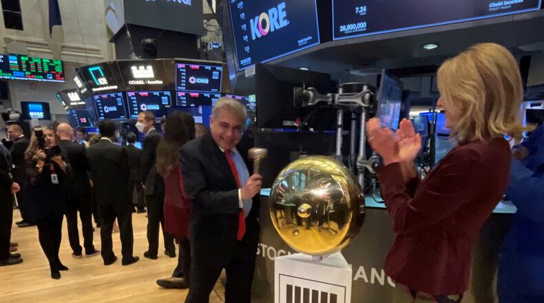 Alpharetta-based tech company KORE Global Holdings became a publicly traded company Friday, with its shares trading on the New York Stock Exchange. Company chief executive officer Romil Bahl rang the trading floor bell. Photo courtesy of KORE.