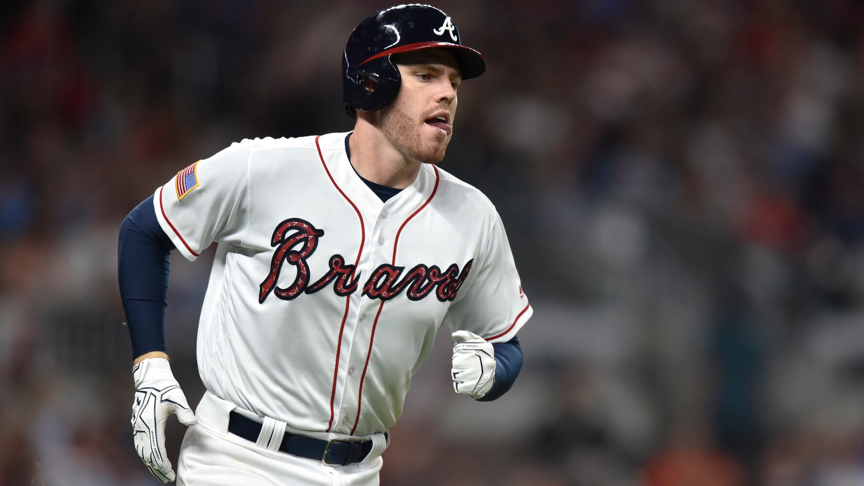 Photos: Freddie Freeman makes first start at third base