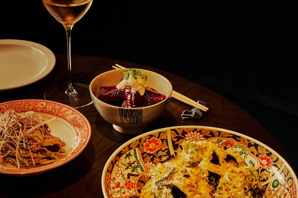 A selection of side dishes from Koshu Club, including green beans goma-ae (left), an eggplant dish called nasu agebitashi (center) and yamitsuki cabbage (right). (Andrew Thomas Lee/Courtesy of Koshu Club)
