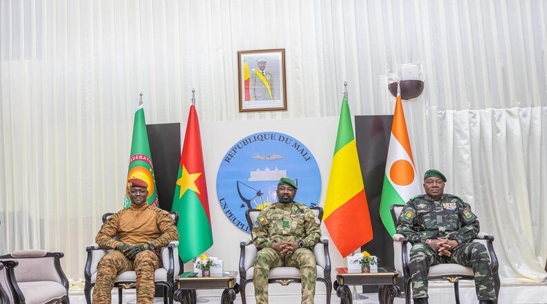 FILE - Captain Ibrahim Traoré of Burkina Faso, left, General Assimi Goïta of Mali, center, and General Abdourahamane Tchiani of Niger attend the second summit on security and development in Bamako, Mali, Tuesday, Dec. 23, 2025. (Mali Government Information Center via AP, File)