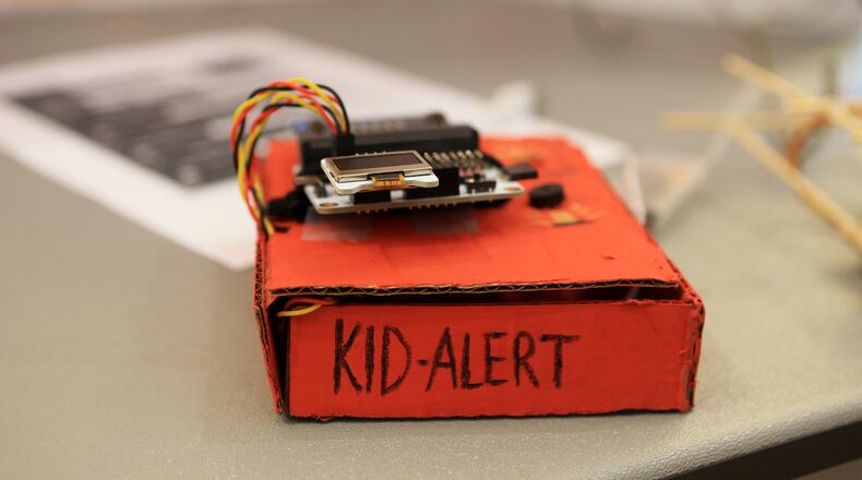 Kid-Alert, the project created by Duluth Middle School students Eric Xu, Daniel Hwang and Ethan Pickle, was one of the prize winners at the 2020 Honeywell STEM Challenge Showcase. CHRISTINA MATACOTTA/CRMATACOTTA@GMAIL.COM