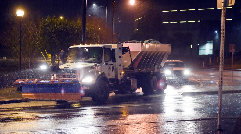 JANUARY 6, 2017 STONE MOUNTAIN DeKalb County public works plows and spreader trucks head to their deployment areas on Friday in anticipation of snow and icy conditions expected to hit later in the day. Forecasts have some metro areas getting up to 5 -inches of snow overnight. KENT D. JOHNSON/ KDJOHNSON@AJC.COM