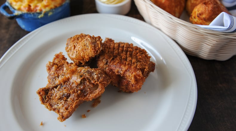 151013-DECATUR-GA- Ligaya Figueras restaurant review of Revival in Decatur on Tuesday October 13, 2015. FOOD: Revival Fried Chicken, mac n' cheese and the Gillespie family iron skillet corn bread. (Becky Stein Photography)