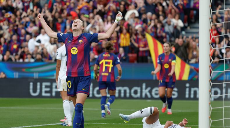 Barcelona's Graham Hansen celebrates after scoring her side's second goal during a Champions League quarterfinal soccer match between Barcelona and Real Madrid, in Barcelona, Spain, Thursday, April 2 2026. (AP Photo/Joan Monfort)