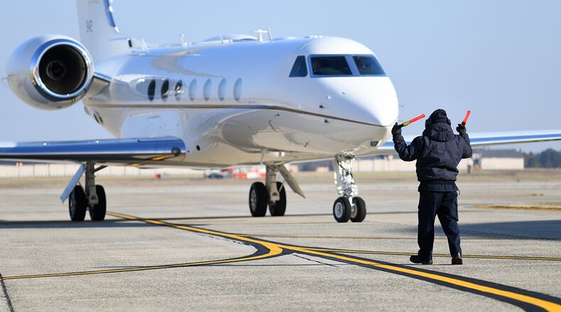 A C-37B Gulfstream 550 aircraft is marshalled through the flightline at Joint Base Andrews, Maryland in December. (U.S. Air Force photo by Tech. Sgt. Kentavist P. Brackin)