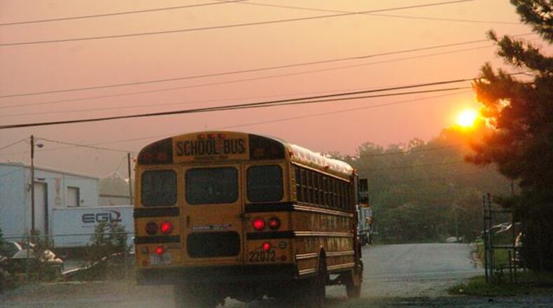 Who should decide when schools resume, the state or the local district?