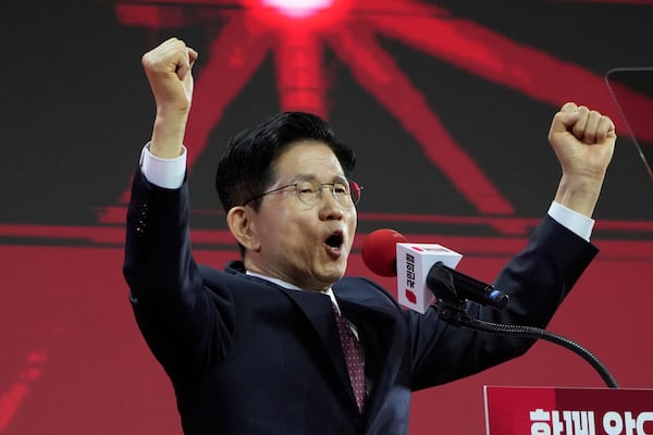 South Korea's former Labor Minister Kim Moon Soo speaks after winning the nomination as the presidential election candidate during the People Power Party's convention in Goyang, South Korea, Saturday, May 3, 2025. (AP Photo/Ahn Young-joon)