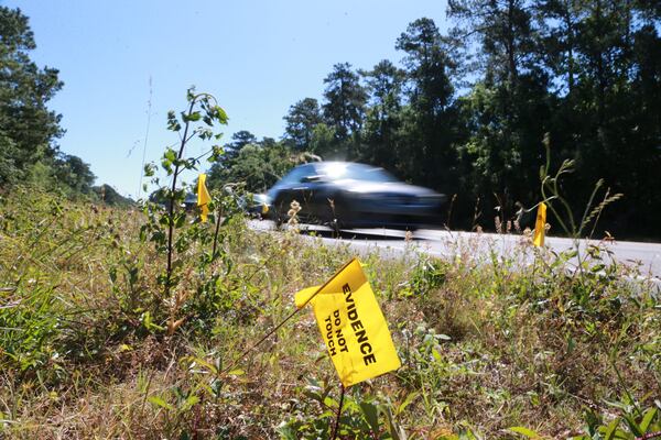 Evidence flags mark the side of Highway 80 where Maggie Evans was struck by a vehicle during a morning bicycle ride on April 12th.