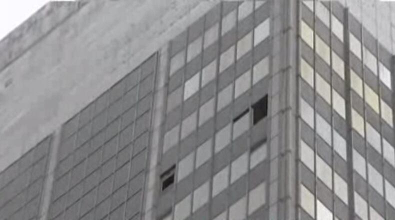 Debris fell Tuesday for a third straight day from the 32-story building. (Credit: Channel 2 Action News)