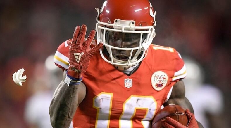 Kansas City Chiefs wide receiver Tyreek Hill (10) loses his mouth piece while returning a punt 78 yards for a touchdown in the second quarter against the Oakland Raiders at Arrowhead Stadium in Raytown, Mo., on Thursday, Dec. 8, 2016. (David Eulitt/Kansas City Star/TNS)
