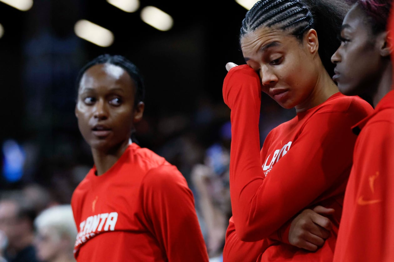 Atlanta Dream players react after losing 87-85 in the first-round playoff game against the Indiana Fever at Gateway Center Arena on Thursday, Sept. 18, 2024, in Atlanta.  (Miguel Martinez/ AJC)